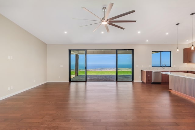 73-4493 Aloha Pl, Kailua-Kona, HI 96740 - unfurnished living room featuring healthy amount of natural light, ceiling fan, dark wood finished floors, and recessed lighting