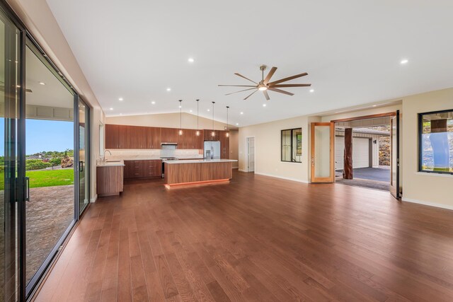 73-4493 Aloha Pl, Kailua-Kona, HI 96740 - unfurnished living room with vaulted ceiling, dark wood-type flooring, a ceiling fan, and recessed lighting