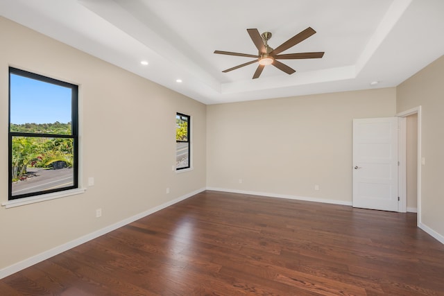 73-4493 Aloha Pl, Kailua-Kona, HI 96740 - empty room with a tray ceiling, a ceiling fan, dark wood finished floors, and recessed lighting