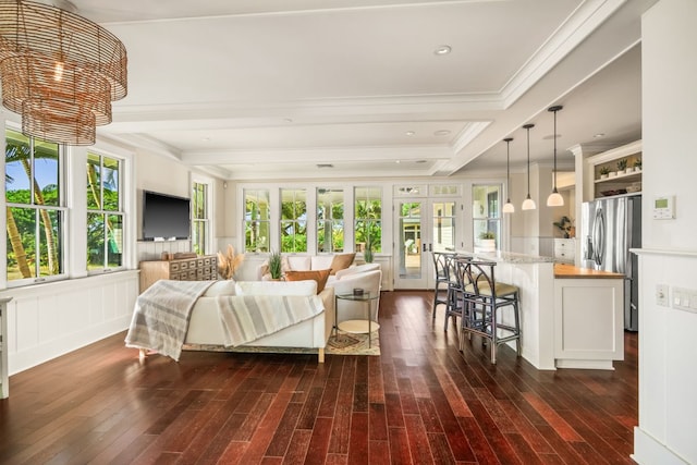 2640 Uluwehi St, Koloa, HI 96756 - living area featuring dark wood finished floors and ornamental molding