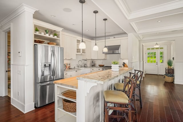 2640 Uluwehi St, Koloa, HI 96756 - kitchen with stainless steel refrigerator with ice dispenser, open shelves, wall chimney exhaust hood, a sink, and dark wood-type flooring