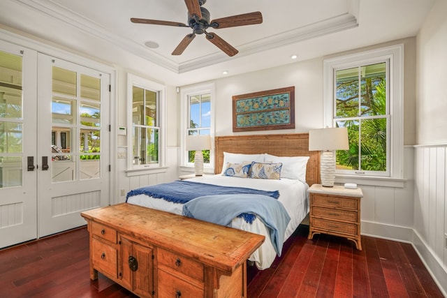 2640 Uluwehi St, Koloa, HI 96756 - bedroom featuring dark wood finished floors, access to exterior, ornamental molding, a ceiling fan, and a raised ceiling