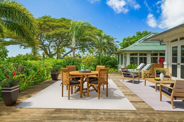 2640 Uluwehi St, Koloa, HI 96756 - view of patio / terrace with a deck, french doors, and outdoor dining area