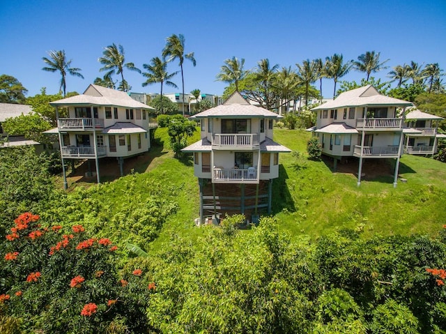 5451 Ka Haku Rd Unit 11, Princeville, HI 96722 - back of property with a balcony