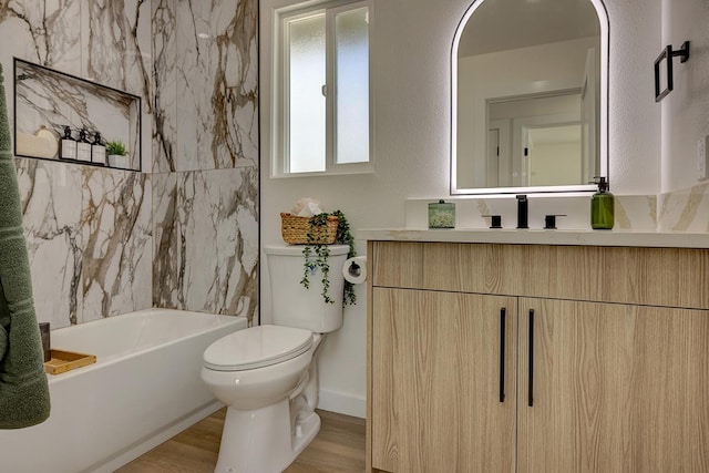 16-2119 Tangerine Dr, Pahoa, HI 96778 - full bathroom featuring toilet, vanity, wood finished floors, and bathtub / shower combination