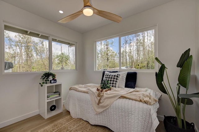 16-2119 Tangerine Dr, Pahoa, HI 96778 - bedroom with baseboards, wood finished floors, ceiling fan, and recessed lighting