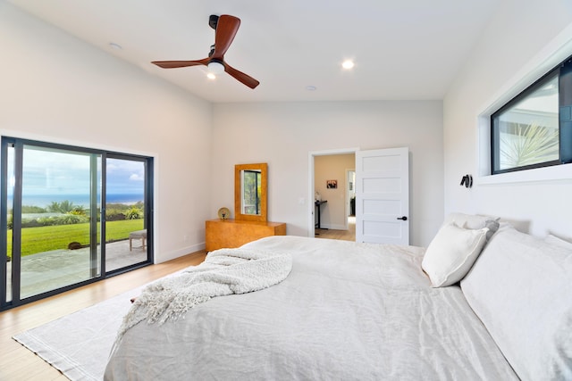 74-941 Kuni St, Kailua-Kona, HI 96740 - bedroom featuring access to exterior, multiple windows, light wood-type flooring, recessed lighting, and vaulted ceiling