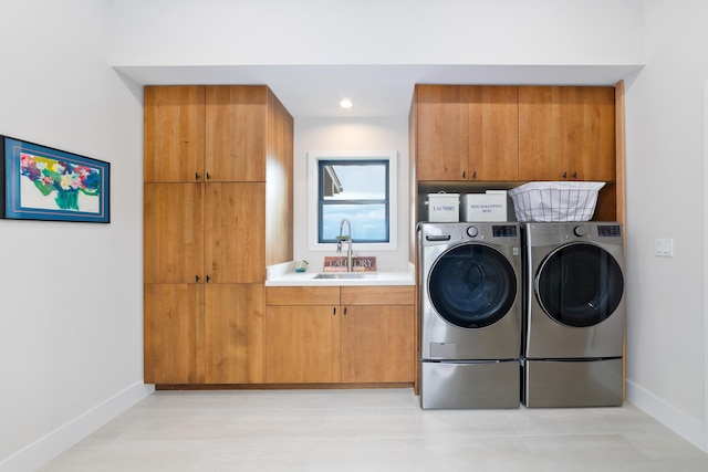 74-941 Kuni St, Kailua-Kona, HI 96740 - laundry area with cabinet space, washer and dryer, baseboards, light tile patterned flooring, and recessed lighting