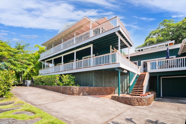 78-134 Holua Rd, Kailua-Kona, HI 96740 - view of front of property featuring stairway and a wooden deck