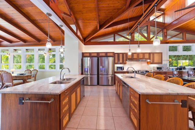 78-134 Holua Rd, Kailua-Kona, HI 96740 - kitchen with stainless steel appliances, a large island, a sink, wooden ceiling, and brown cabinets