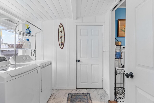 15-1518 20th Ave, Hilo, HI 96749 - washroom featuring independent washer and dryer, wood ceiling, and light marble finish flooring
