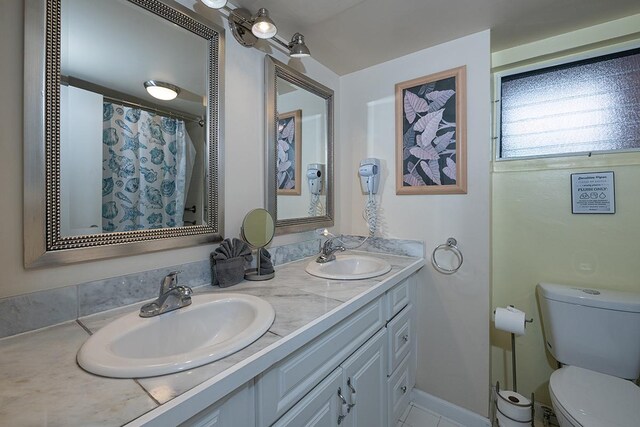 75-5766 Kuakini Hwy Unit 503, Kailua-Kona, HI 96740 - bathroom with double vanity and toilet