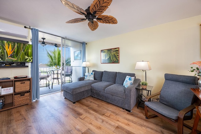 75-5766 Kuakini Hwy Unit 503, Kailua-Kona, HI 96740 - living room with ceiling fan and light wood-style flooring