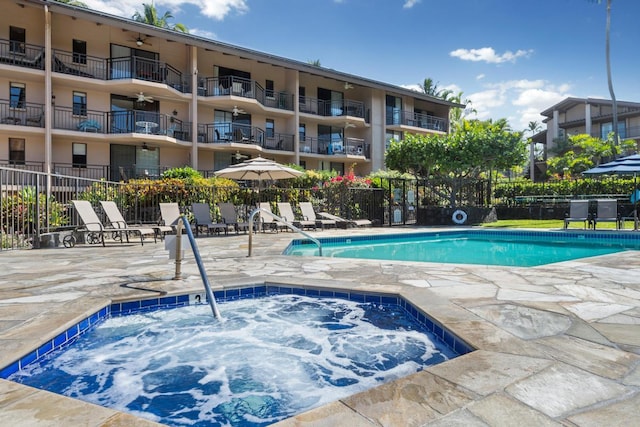 75-6026 Alii Dr Unit 5206, Kailua-Kona, HI 96740 - community pool featuring a ceiling fan and a patio