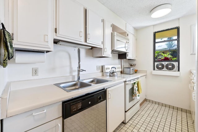 75-6026 Alii Dr Unit 5206, Kailua-Kona, HI 96740 - kitchen with white appliances, light countertops, white cabinetry, and a textured ceiling