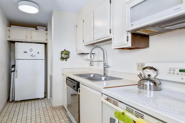 75-6026 Alii Dr Unit 5206, Kailua-Kona, HI 96740 - kitchen with white appliances, light countertops, a sink, white cabinetry, and light tile patterned flooring