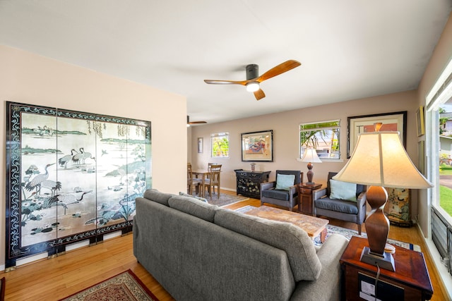 4911 Aliali Rd Unit 0002, Kapaa, HI 96746 - living room featuring wood finished floors, plenty of natural light, and ceiling fan