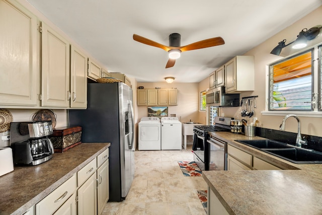 4911 Aliali Rd Unit 0002, Kapaa, HI 96746 - kitchen featuring washer and dryer, a sink, appliances with stainless steel finishes, and a ceiling fan