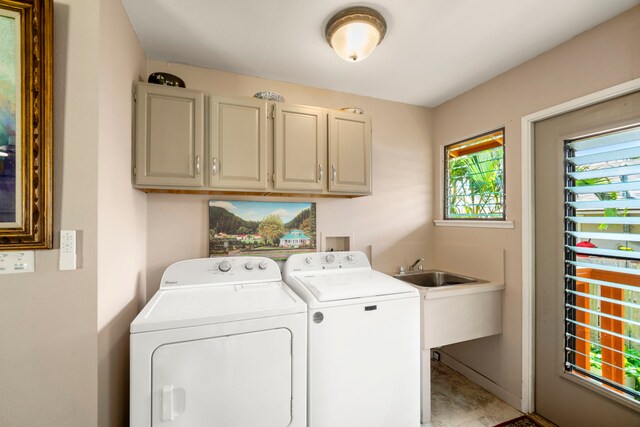 4911 Aliali Rd Unit 0002, Kapaa, HI 96746 - laundry area featuring cabinet space and independent washer and dryer