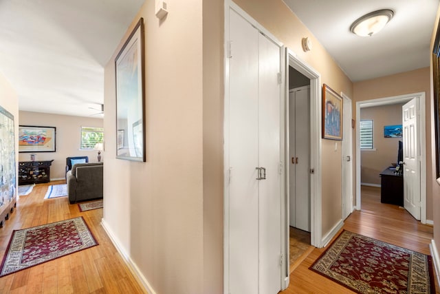 4911 Aliali Rd Unit 0002, Kapaa, HI 96746 - corridor with light wood-style flooring and baseboards