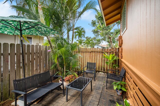 4911 Aliali Rd Unit 0002, Kapaa, HI 96746 - fenced backyard featuring a patio area