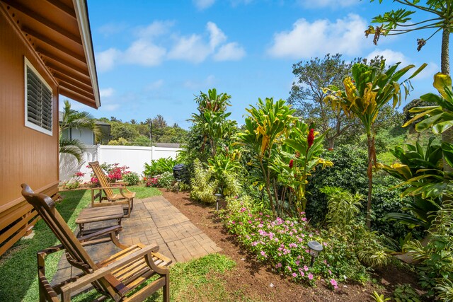 4911 Aliali Rd Unit 0002, Kapaa, HI 96746 - view of yard featuring a patio