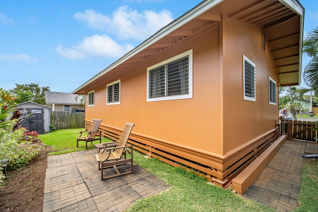 4911 Aliali Rd Unit 0002, Kapaa, HI 96746 - view of side of home with a patio