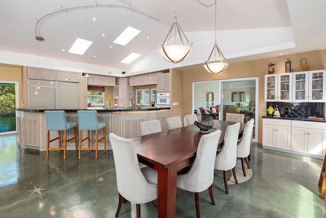 71-1410 Puu Kamanu Ln, Kailua-Kona, HI 96740 - dining area featuring concrete flooring, a skylight, and lofted ceiling