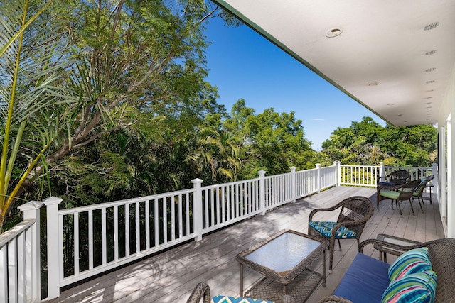71-1410 Puu Kamanu Ln, Kailua-Kona, HI 96740 - wooden deck featuring view of wooded area