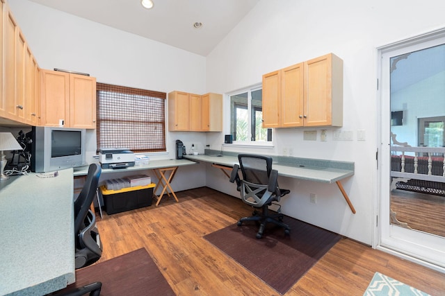 71-1410 Puu Kamanu Ln, Kailua-Kona, HI 96740 - home office featuring built in desk, wood finished floors, and high vaulted ceiling