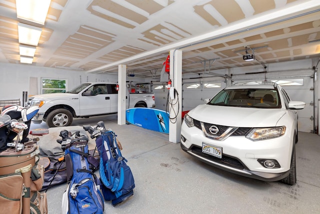 71-1410 Puu Kamanu Ln, Kailua-Kona, HI 96740 - garage featuring washing machine and dryer and a garage door opener
