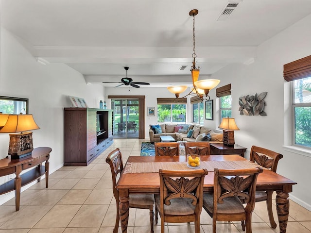 68-1125 Kaniku Dr Unit 2105, Kamuela, HI 96743 - dining area featuring beam ceiling, light tile patterned flooring, baseboards, and ceiling fan