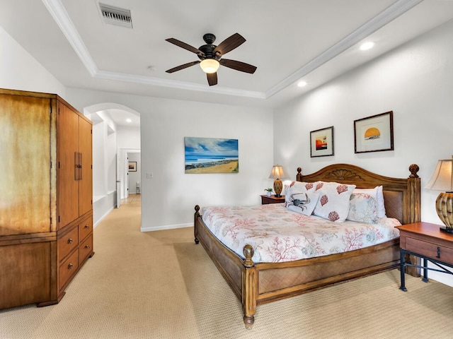 68-1125 Kaniku Dr Unit 2105, Kamuela, HI 96743 - bedroom featuring a tray ceiling, recessed lighting, arched walkways, light carpet, and baseboards