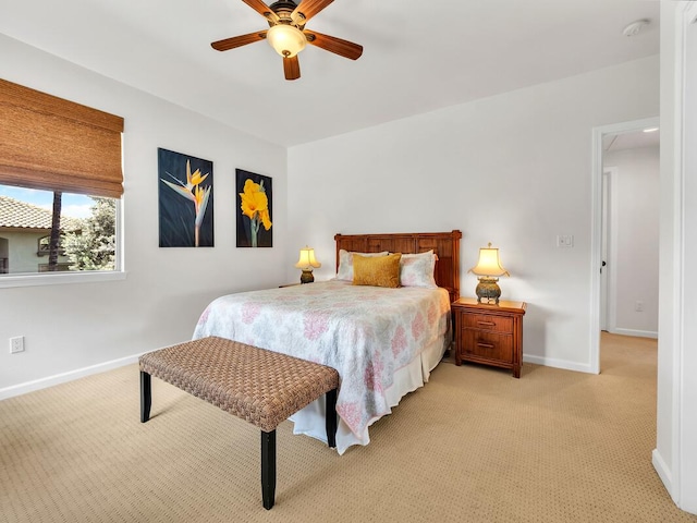 68-1125 Kaniku Dr Unit 2105, Kamuela, HI 96743 - bedroom with light carpet, baseboards, and a ceiling fan
