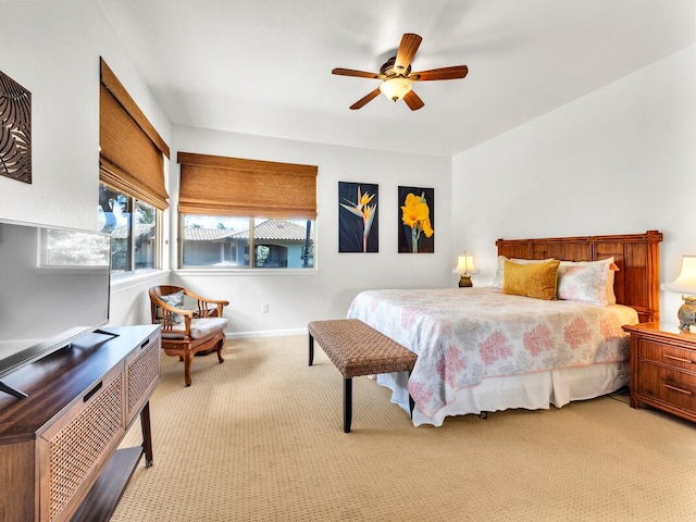 68-1125 Kaniku Dr Unit 2105, Kamuela, HI 96743 - bedroom featuring light colored carpet, baseboards, and ceiling fan