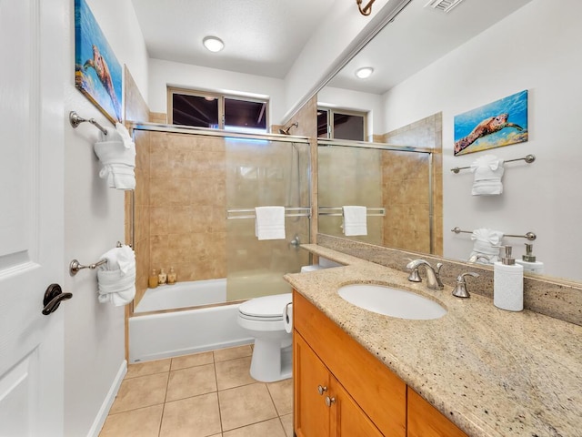 68-1125 Kaniku Dr Unit 2105, Kamuela, HI 96743 - full bathroom featuring tile patterned floors, vanity, toilet, enclosed tub / shower combo, and baseboards