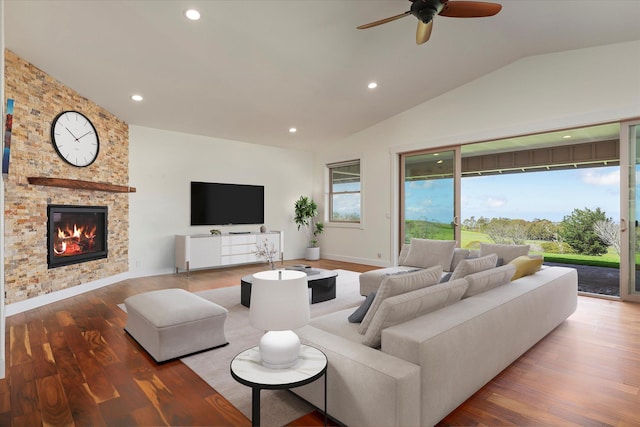 67-1027 Wainoenoe Rd, Kamuela, HI 96743 - living room featuring wood finished floors, a ceiling fan, a large fireplace, recessed lighting, and vaulted ceiling