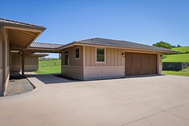 67-1027 Wainoenoe Rd, Kamuela, HI 96743 - view of front of home featuring board and batten siding and metal roof