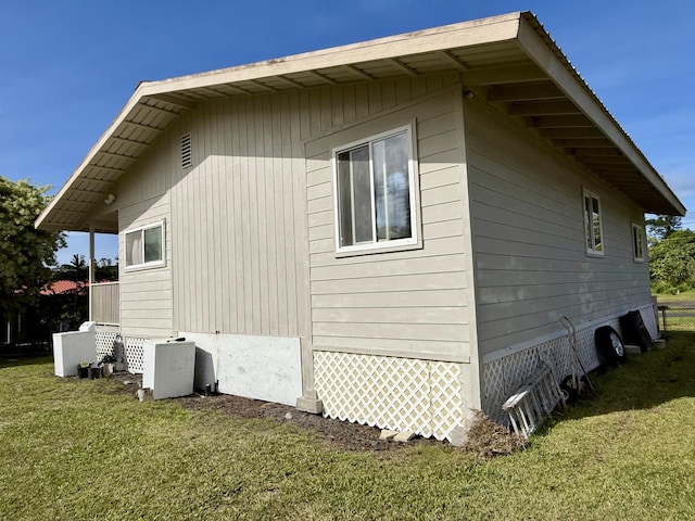 15-2690 Mahimahi St, Pahoa, HI 96778 - view of side of property with a yard