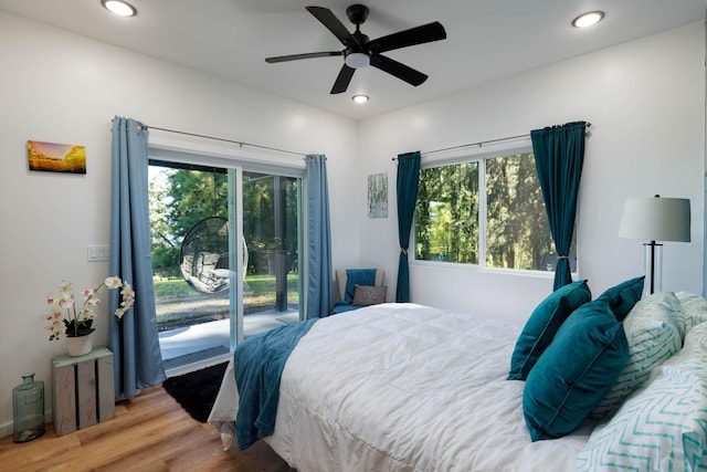 36-574 Spencer Rd, Laupahoehoe, HI 96764 - bedroom with access to exterior, wood finished floors, a ceiling fan, and recessed lighting