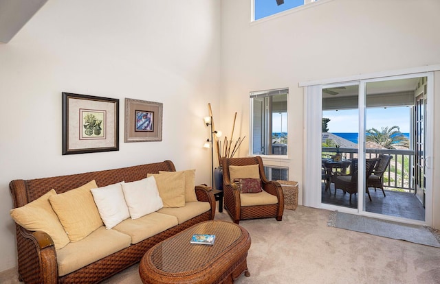75-5919 Alii Dr Unit U23, Kailua-Kona, HI 96740 - carpeted living room with a towering ceiling