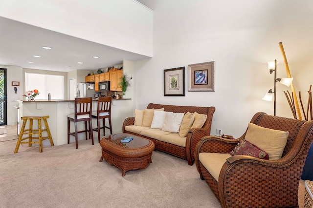 75-5919 Alii Dr Unit U23, Kailua-Kona, HI 96740 - living room with light colored carpet and recessed lighting