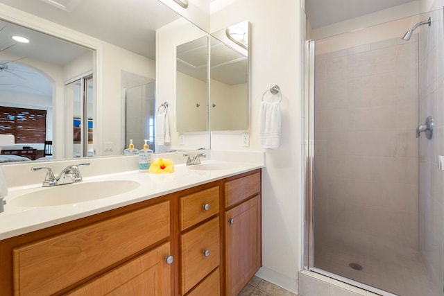 75-5919 Alii Dr Unit U23, Kailua-Kona, HI 96740 - bathroom with a shower stall, double vanity, and connected bathroom
