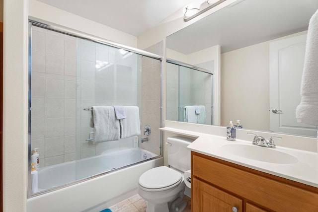 75-5919 Alii Dr Unit U23, Kailua-Kona, HI 96740 - bathroom featuring vanity, toilet, enclosed tub / shower combo, and tile patterned floors