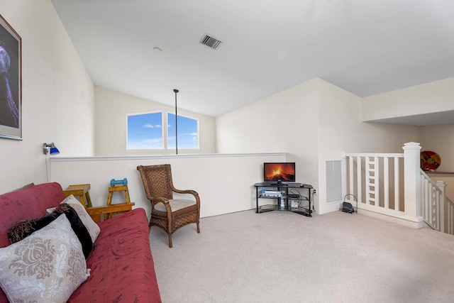 75-5919 Alii Dr Unit U23, Kailua-Kona, HI 96740 - sitting room featuring an upstairs landing, carpet floors, and vaulted ceiling