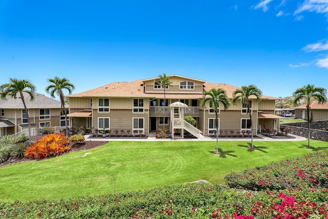 75-5919 Alii Dr Unit U23, Kailua-Kona, HI 96740 - view of community with a patio area, stairway, a lawn, and a deck