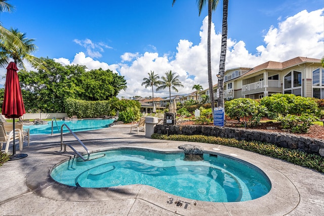 75-5919 Alii Dr Unit U23, Kailua-Kona, HI 96740 - community pool with a patio area and a hot tub