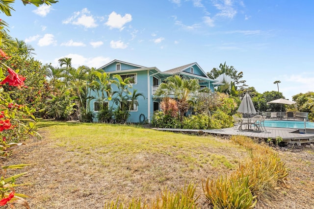 76-6302 Leone St, Kailua-Kona, HI 96740 - view of grassy yard featuring an outdoor pool