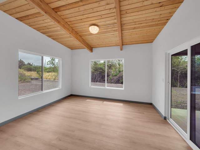 94-1679 Kaulua St, Naalehu, HI 96772 - empty room featuring plenty of natural light, wood ceiling, wood finished floors, and baseboards