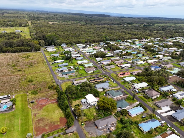 18-7862 N Lauko Rd, Mountain View, HI 96771 - aerial view of property and surrounding area featuring a forest and nearby suburban area
